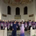 2025 - Foto di gruppo del Coro Monteverdi assieme al coro ospite Eco Vana Voce della Val d&rsquo;Aosta nella Basilica di Sant&rsquo;Eufemia a Grado.